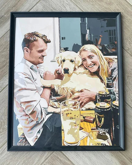 Custom paint by numbers portrait of a smiling couple sitting at a table with their golden retriever, illustrated in a modern painted style and framed on a wooden floor.