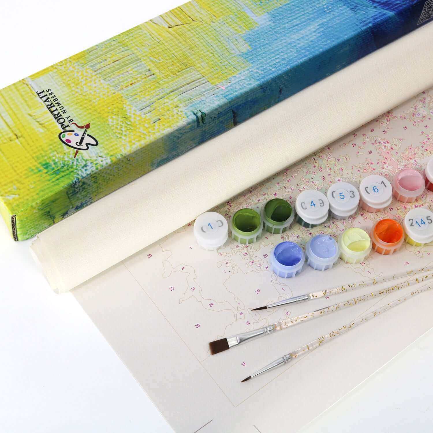 Tribal Sun Paint by Numbers Kit with vibrant paints, brushes, and canvas ready for creative expression.