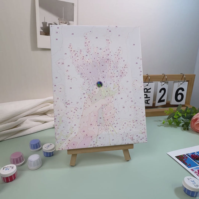 Step by step paint by numbers kit tutorial showing how to paint a mini portrait using numbered sections, acrylic paint, and fine detail brushes.